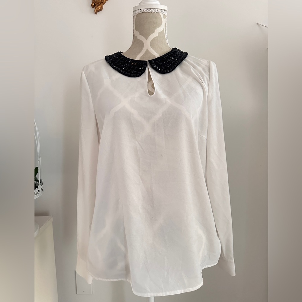 White beaded black and white blouse